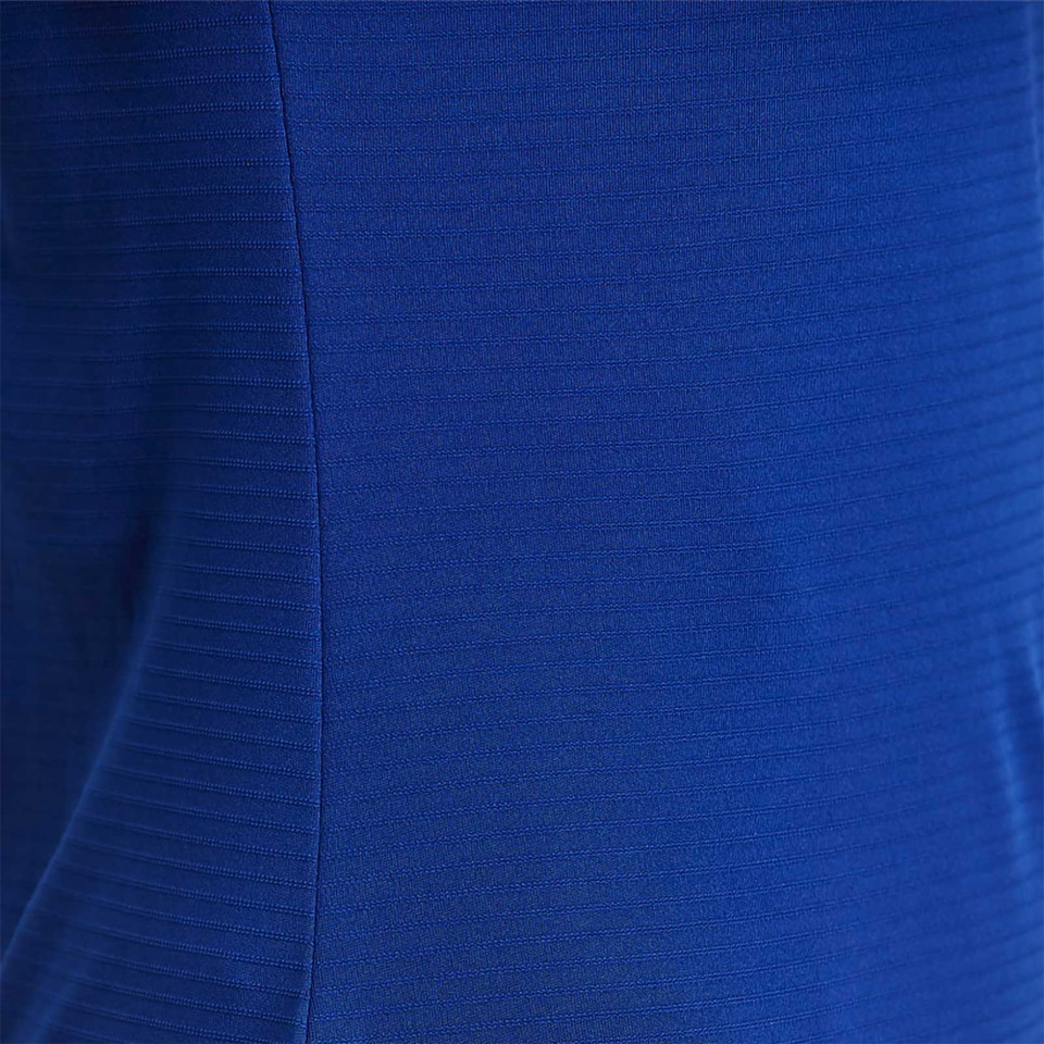 Royal blue CoolDry polo shirt featuring self-striped textured fabric with tonal side panel detail