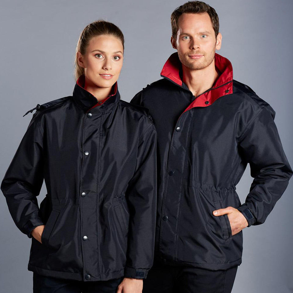 Navy water-resistant jacket with red polar fleece-lined hood and snap-button front closure