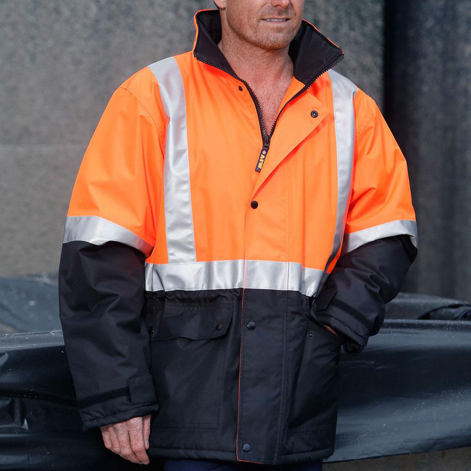 Man wearing orange and navy hi-vis jacket with 3M reflective chest and sleeve tapes, zip front and snap buttons