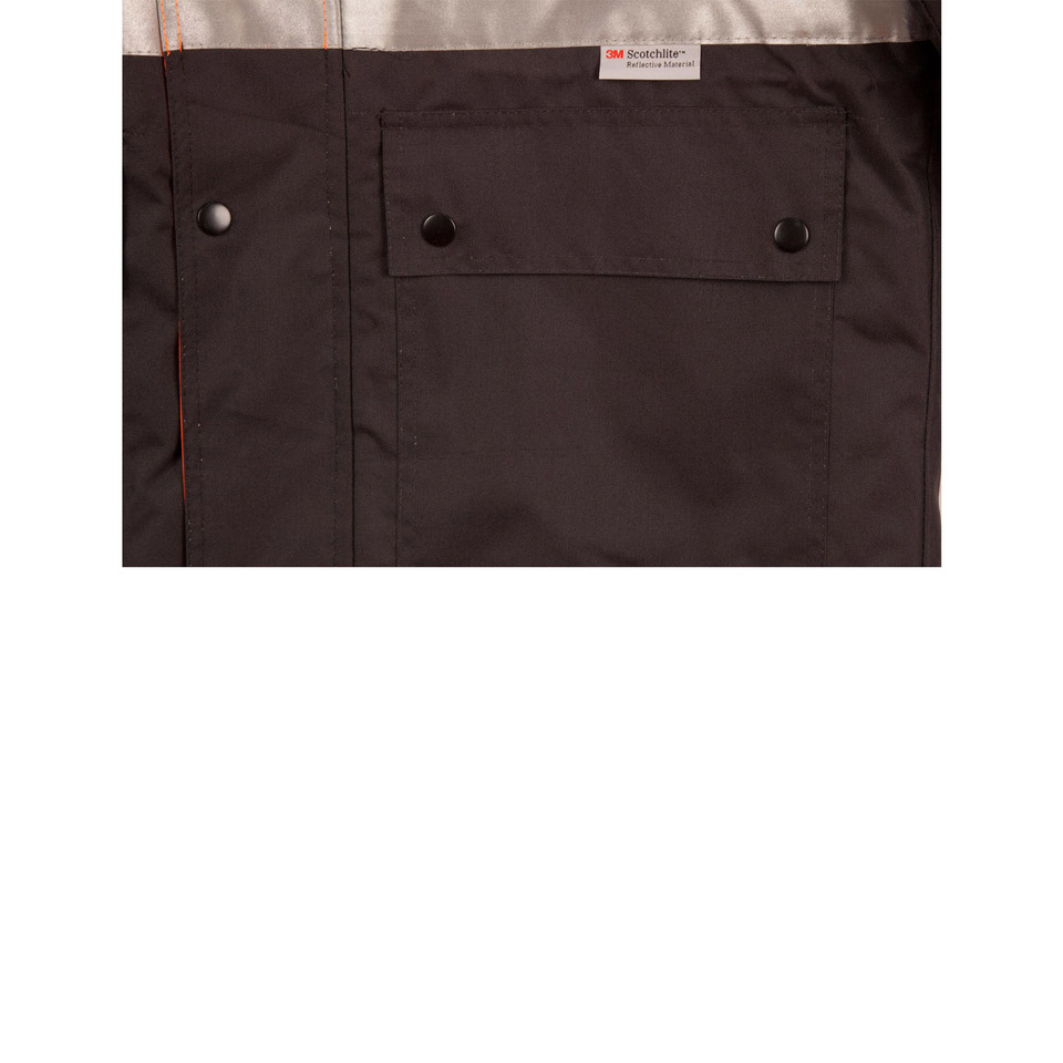 Close-up of dark brown hi-vis rain jacket chest pocket with snap buttons and 3M Scotchlite reflective label, orange contrast panel visible