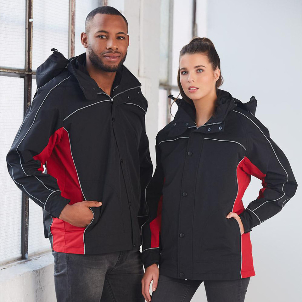 Male and female models wearing black and red 3-in-1 jacket with contrast panels and reflective piping