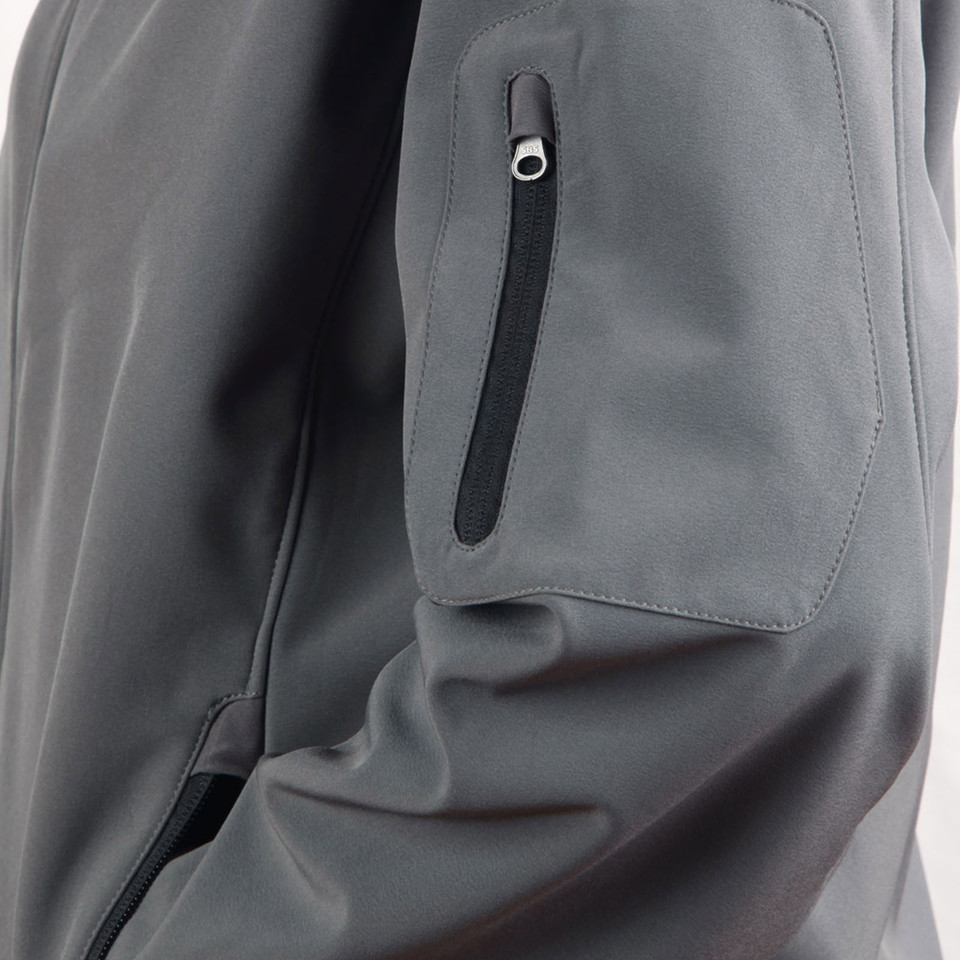 Charcoal grey softshell jacket with zippered sleeve pocket and black contrast trim