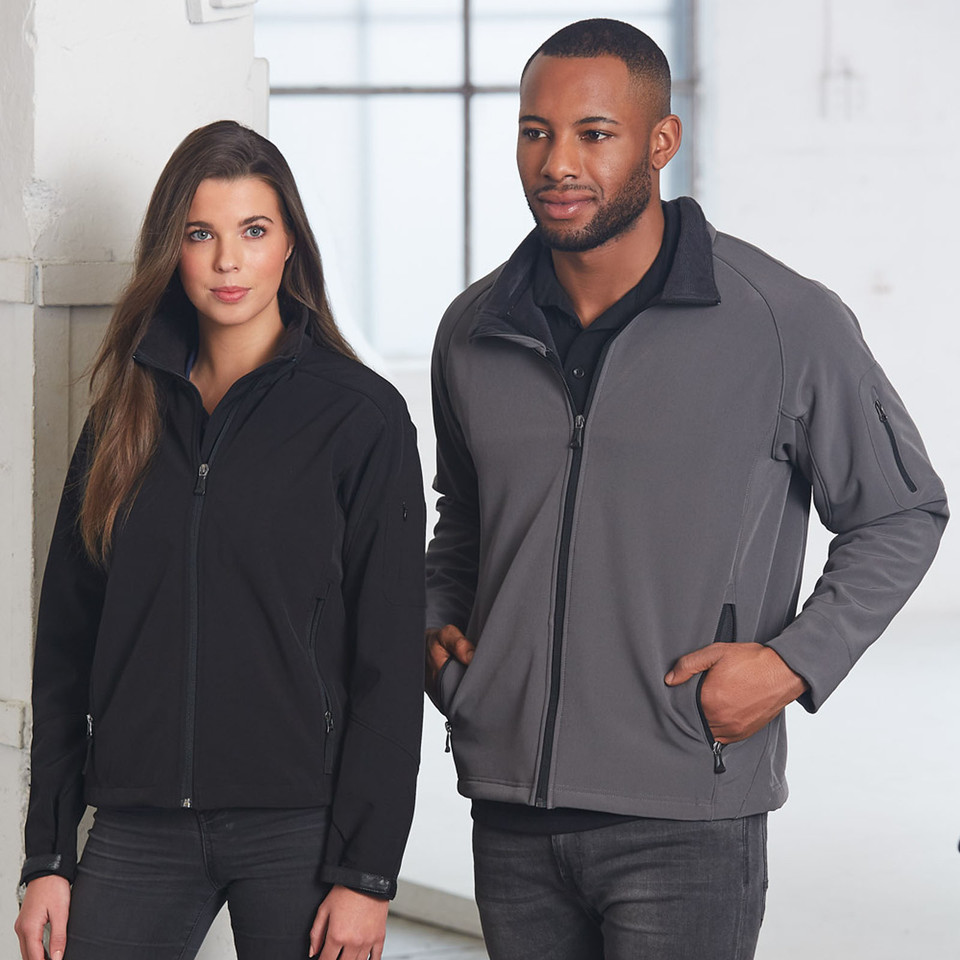 Black and charcoal grey softshell jackets with full zip closure, side pockets, and arm utility pocket detail