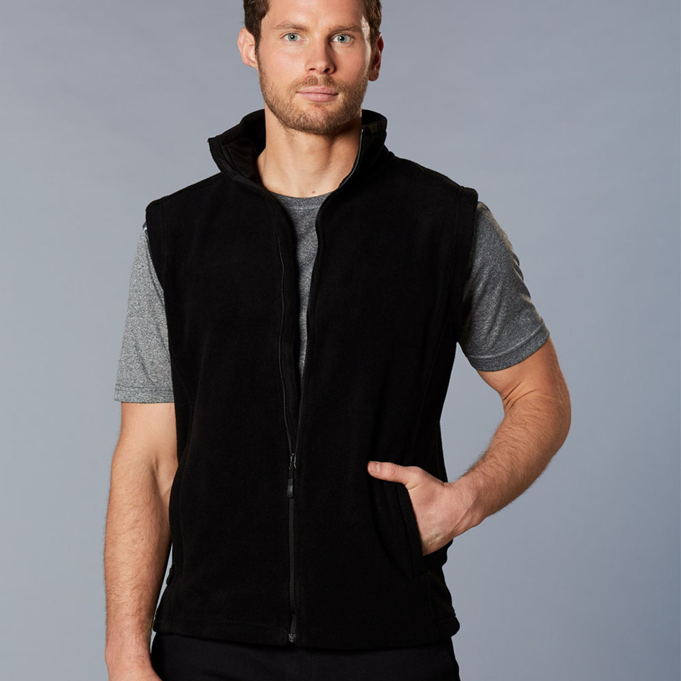 Black polar fleece vest with full zip closure and side pockets worn over grey tee