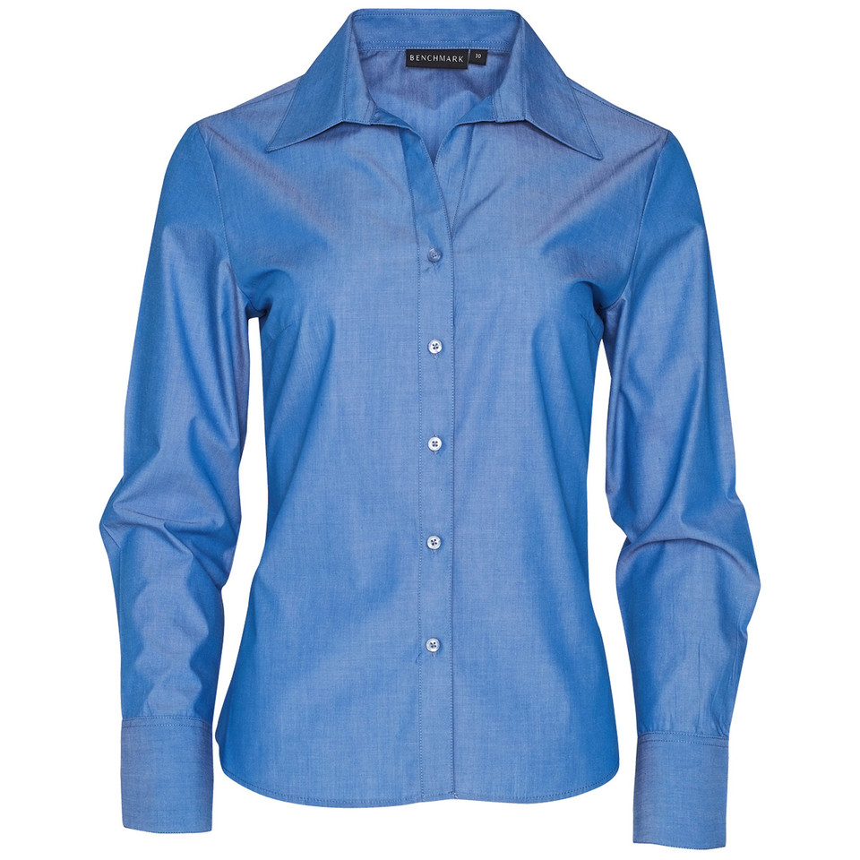 Chambray blue ladies long sleeve button-up shirt with spread collar and fitted silhouette
