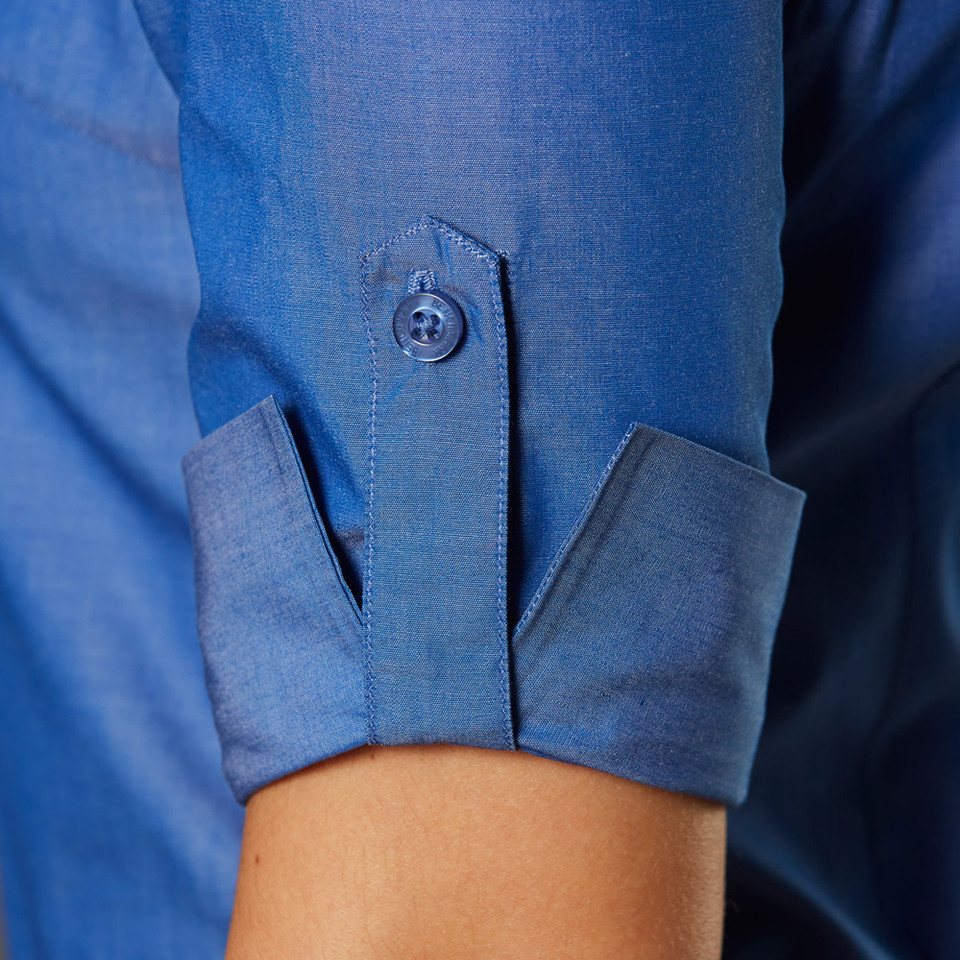Slate blue dress shirt sleeve with grey contrast cuff and button placket detail