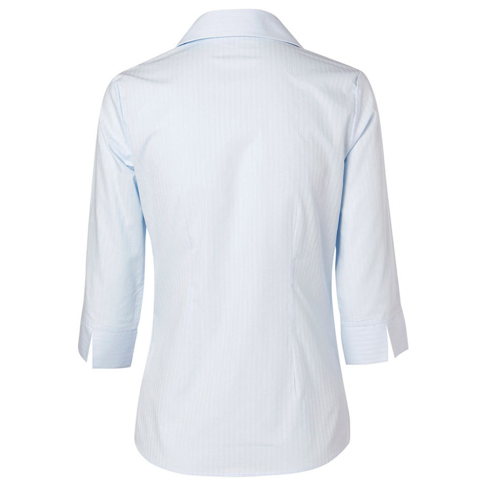 Back view of a pale blue self-stripe women's shirt with 3/4 sleeves and shirt tail hem