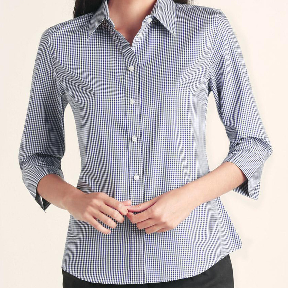 Women wearing navy and white gingham check 3/4 sleeve shirt with point collar, button front and chest pocket