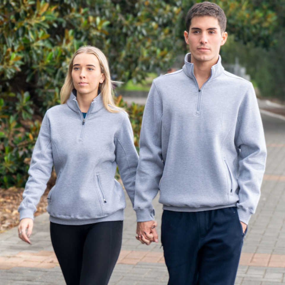 Light grey half-zip fleece pullover with contrast navy zipper and kangaroo pocket, unisex sizing shown