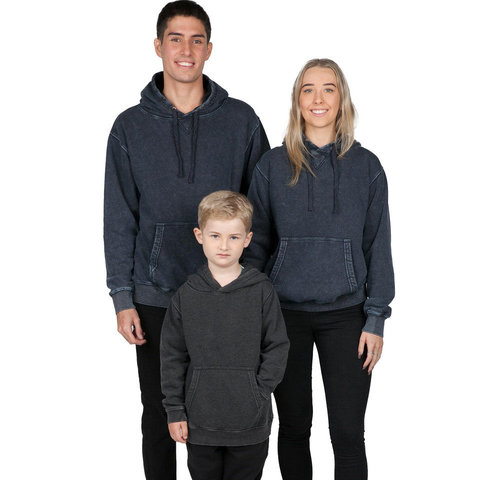 Child wearing charcoal stone-washed fleece pullover hoodie, with two adults in matching navy stone-washed hoodies behind