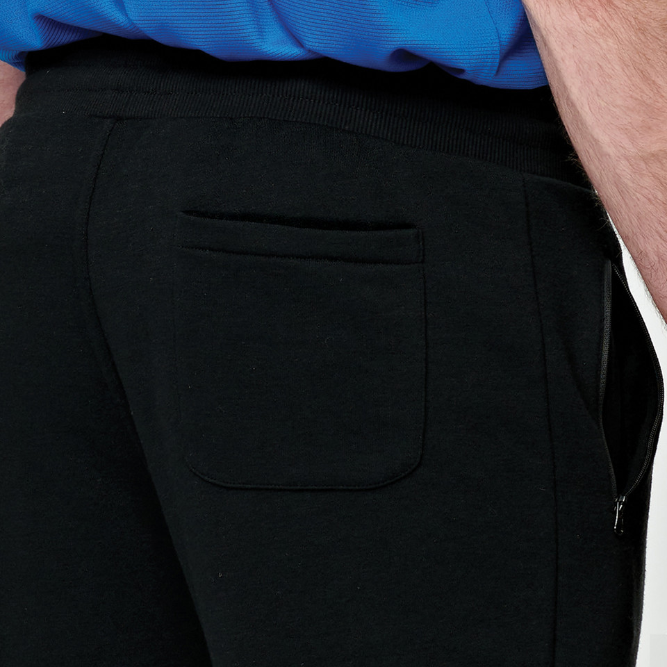Black French terry jogger pants with ribbed waistband and back patch pocket detail