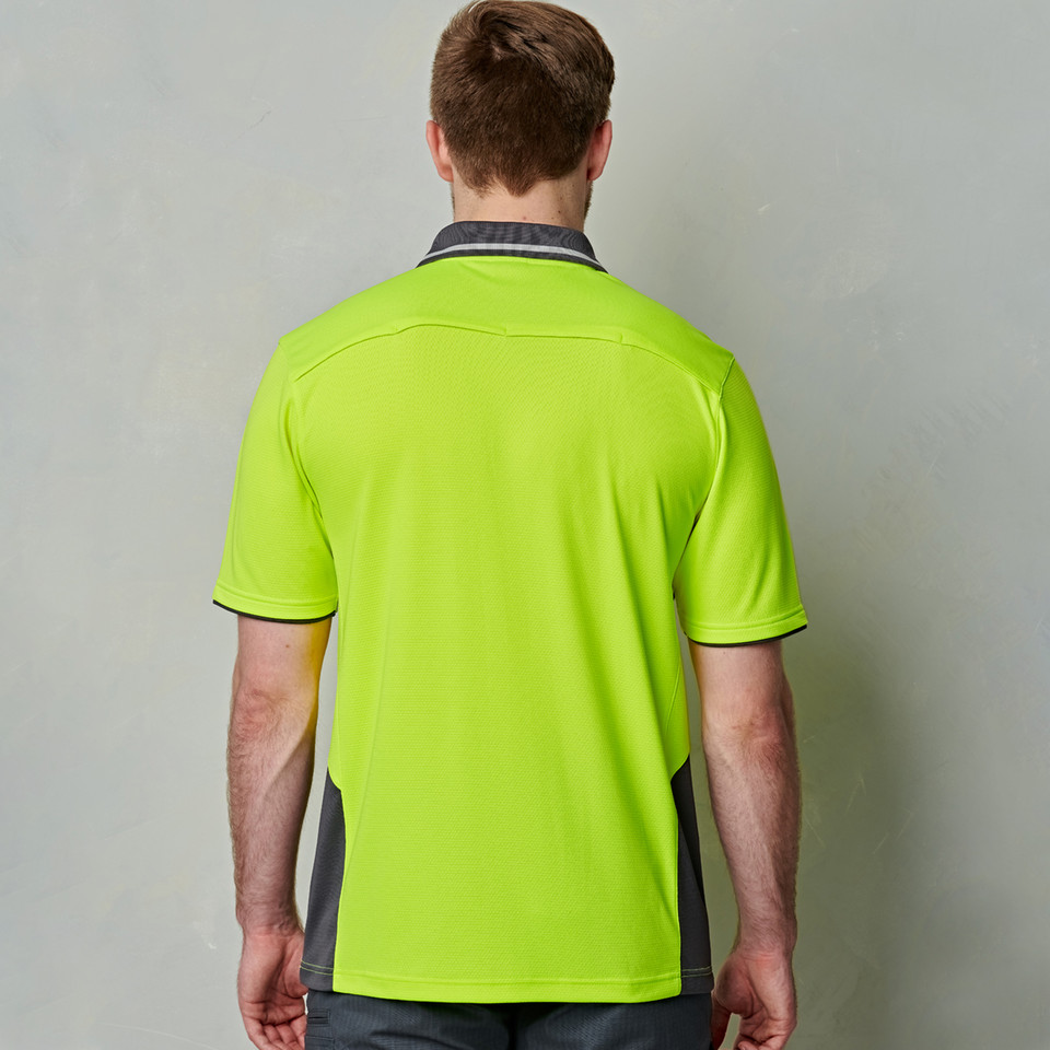 Hi-vis lime polo shirt back view with navy side panels and contrast collar trim