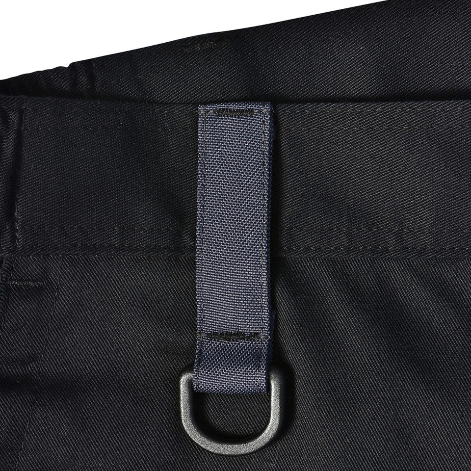 Black cargo work pants with gunmetal D-ring and charcoal grey webbing loop detail