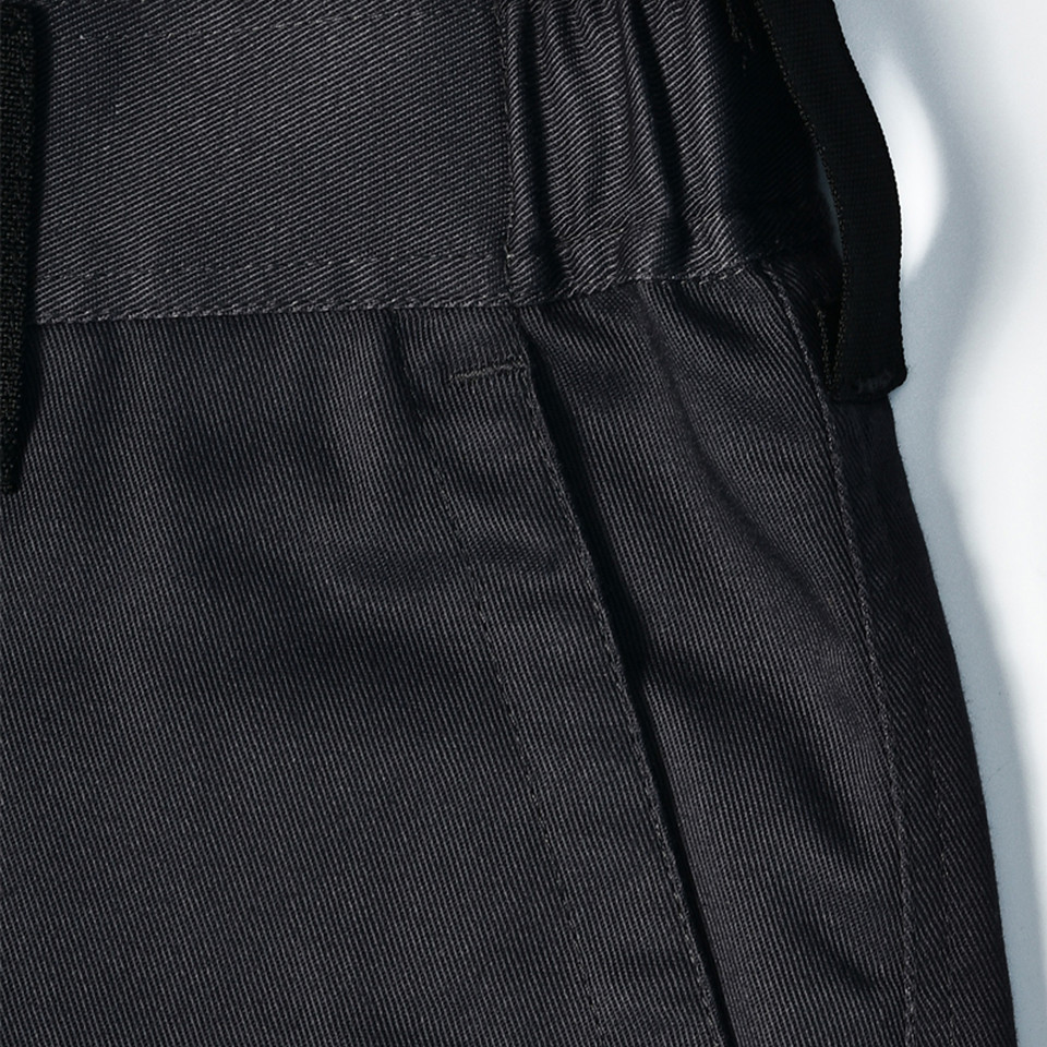 Charcoal grey cargo work pants with side pocket detail and textured stretch fabric