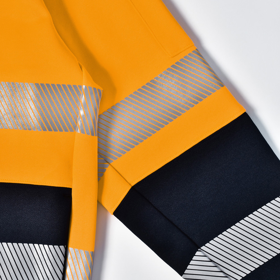 High-visibility orange jumper with black lower panel and silver reflective tape stripes across torso and sleeves