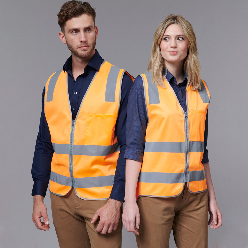 Man and woman wearing fluoro orange hi-vis safety vests with grey reflective tape strips and front zip closure
