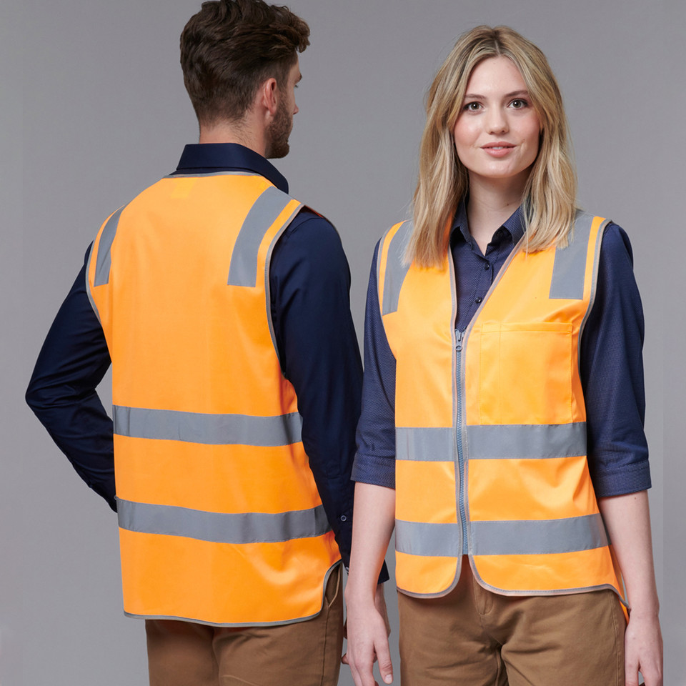 Man and woman wearing fluoro orange hi-vis safety vests with grey reflective tape bands, zip front and chest pocket visible