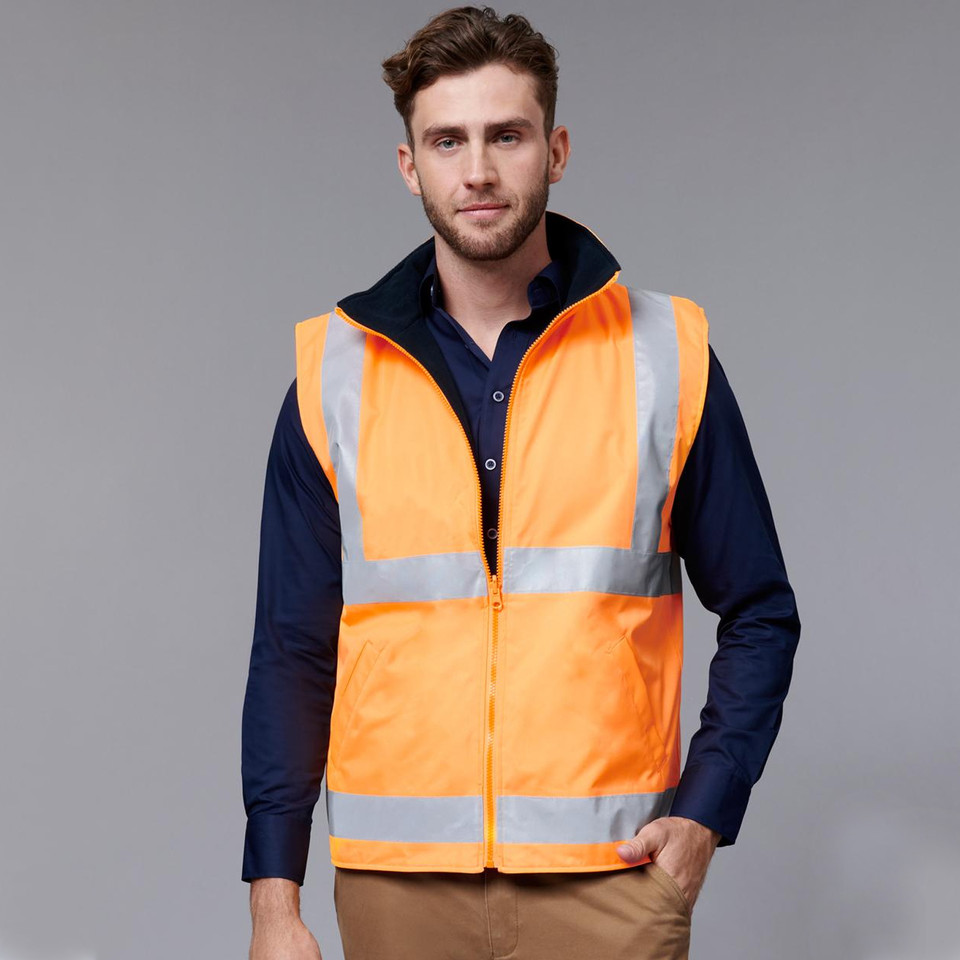 Fluorescent orange hi-vis safety vest with silver reflective tape, featuring zip front and reversible polar fleece construction