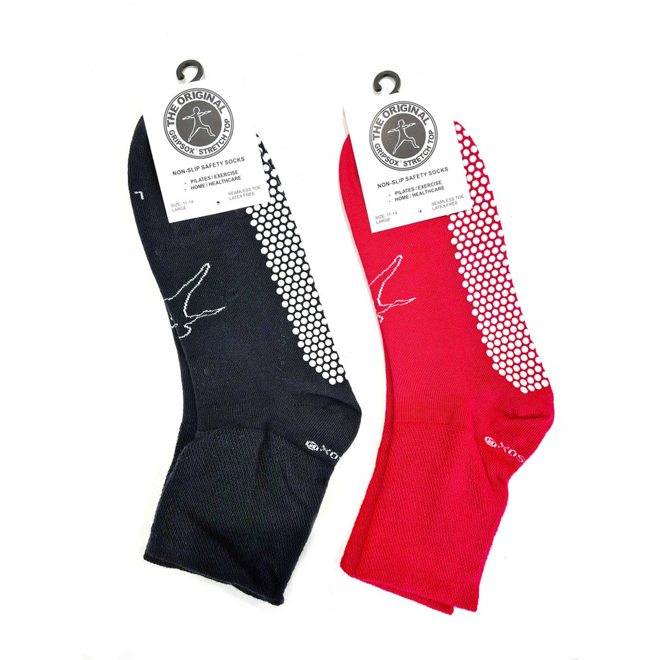 Navy and red crew socks with white grip dots on sole and stretchy ribbed cuffs