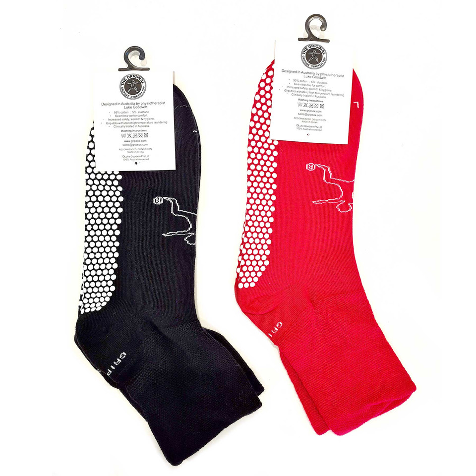 Black and red crew socks with white grippy dots on foot panels and kangaroo logo on ankle
