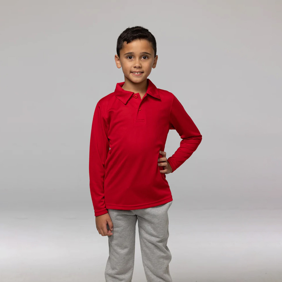 Kids long sleeve polo shirt in red with collar and grey pants on model