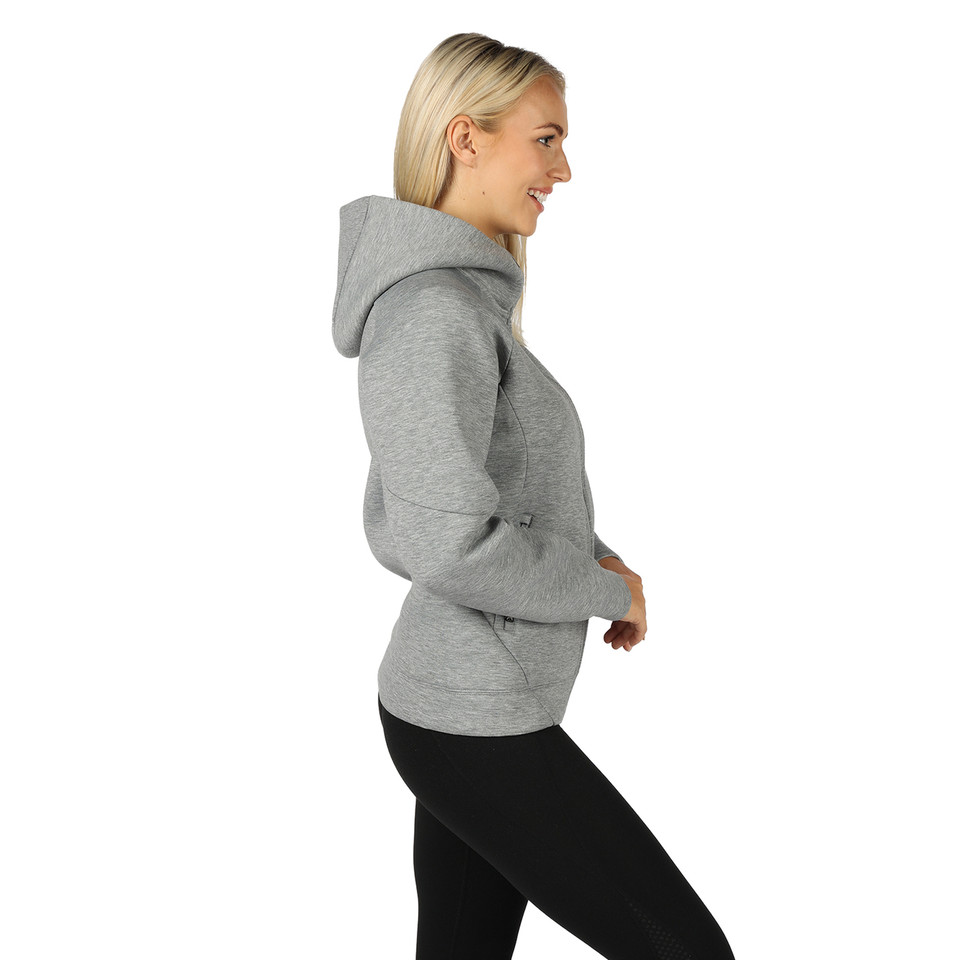 Grey marle hooded jacket with high neckline and black contrast leggings shown in side profile