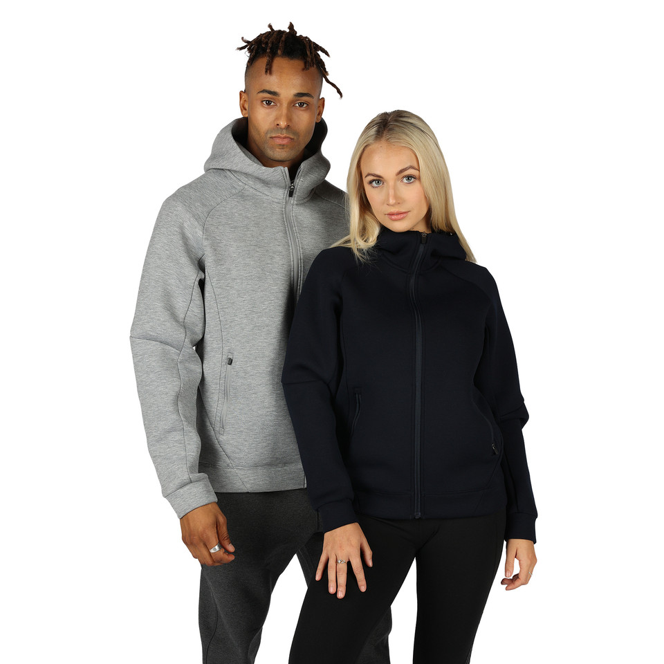Male and female models wearing full-zip hooded jackets in marle grey and navy, with high neckline and kangaroo pockets