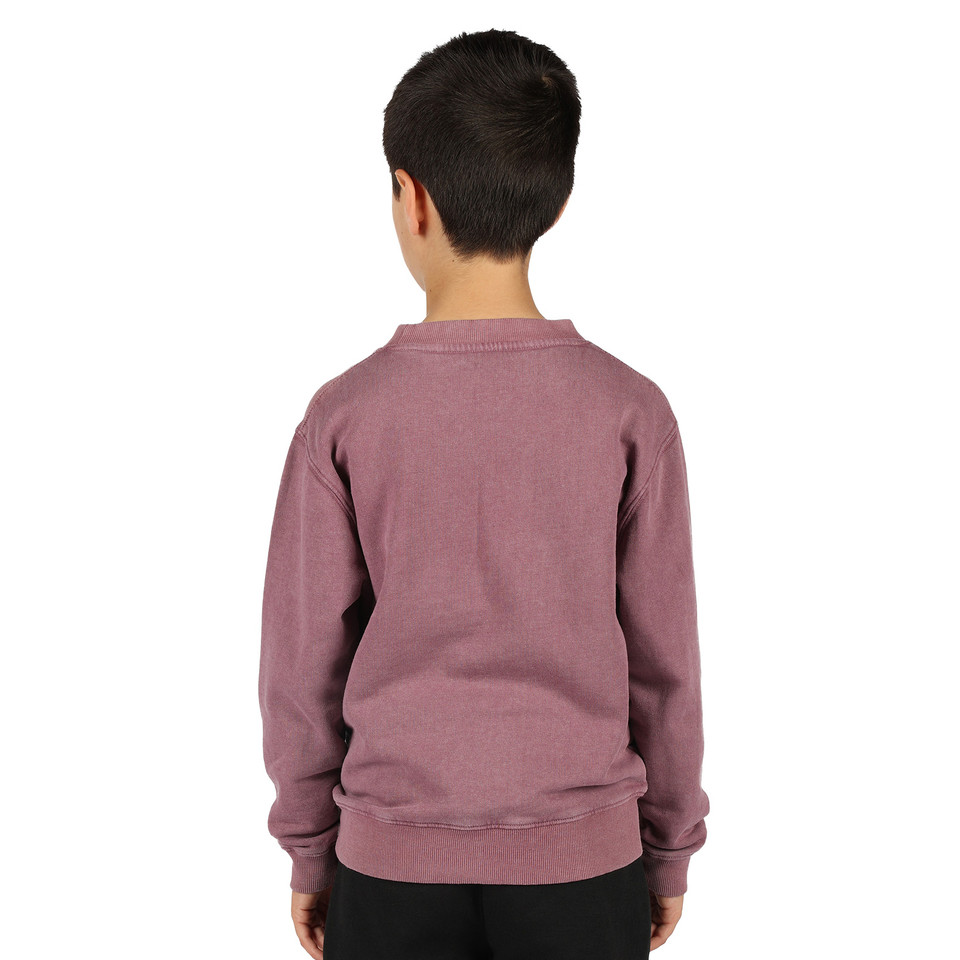 Child wearing dusty mauve stone washed kids crew neck sweater, rear view showing ribbed cuffs and hem