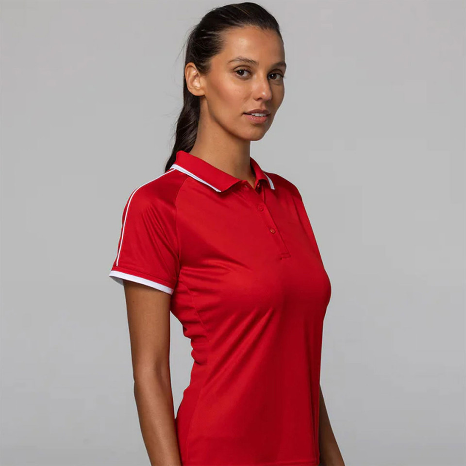 Red polo shirt with white contrast tipping on collar and sleeves, raglan construction, women's fit