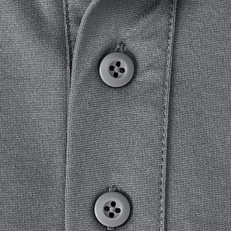 Grey polo shirt fabric showing button placket with contrast stitching and four-hole buttons