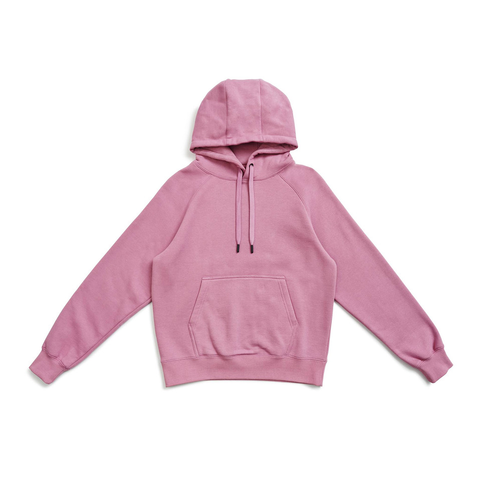 Rose pink cotton rich hoodie with kangaroo pocket and matching drawstrings laid flat on white background