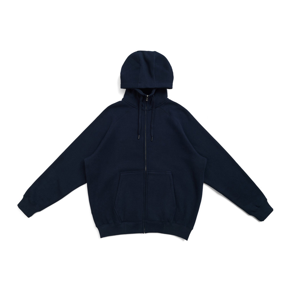 Navy zip-up hoodie with kangaroo pocket and drawstring hood laid flat on white background