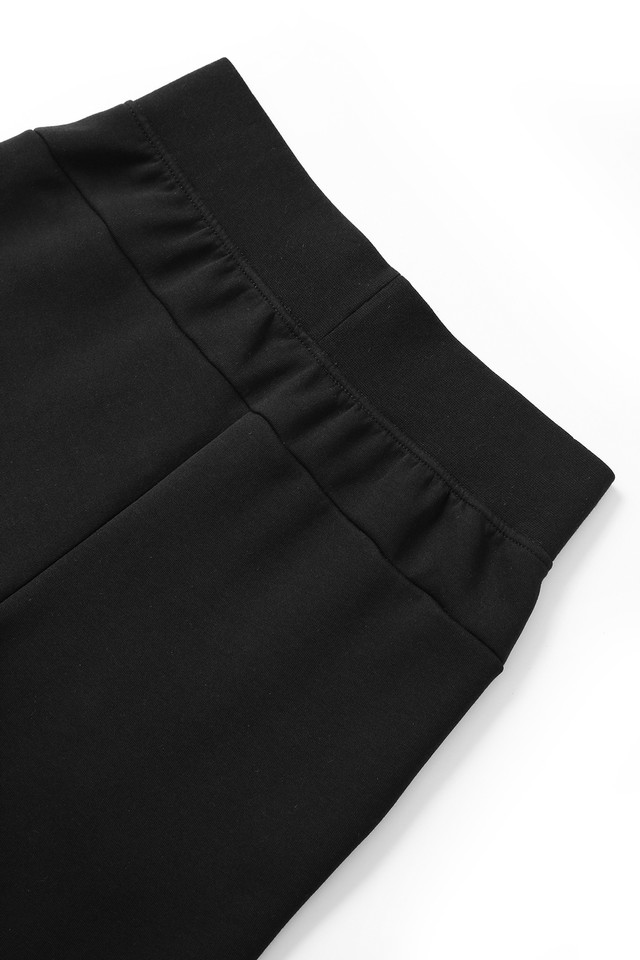 Black ladies track pants with elasticated waistband and soft cotton construction