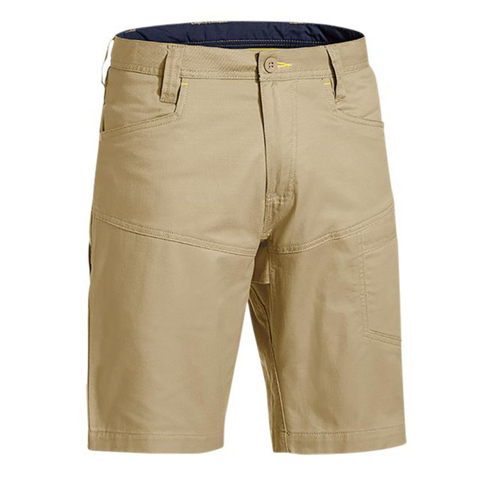 Khaki ripstop work shorts with navy contrast waistband lining and multiple utility pockets