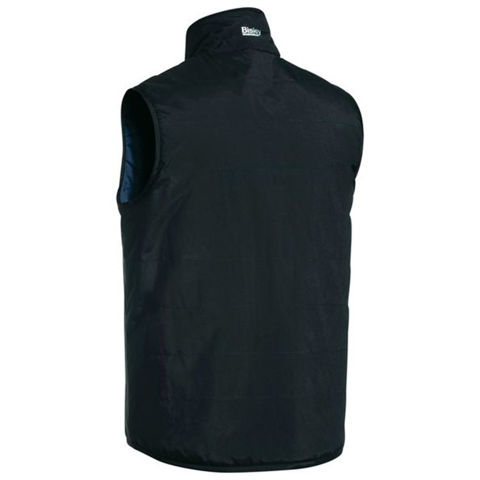 Navy reversible puffer vest rear view showing smooth shell side with stand collar and blue quilted lining visible at armholes