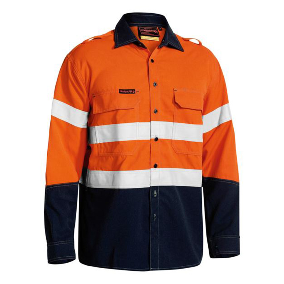 Orange and navy hi-vis long sleeve work shirt with reflective tape, chest pockets, and two-tone panelling