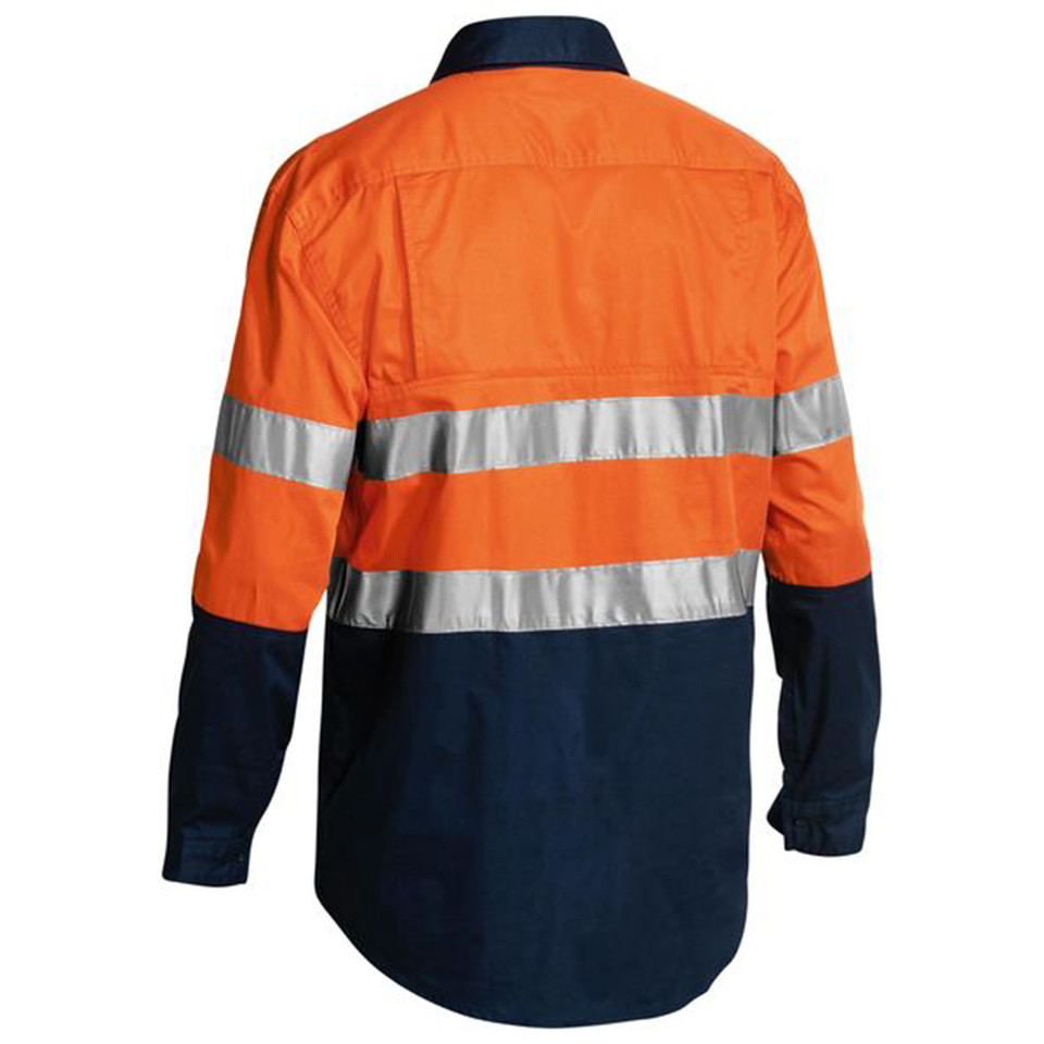 Hi-vis work shirt with orange upper body, navy lower section, and dual reflective tape stripes across back