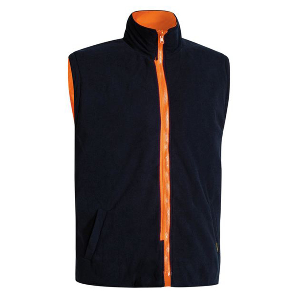 Navy fleece vest with orange contrast zip, collar lining, and side pockets — packshot flat view