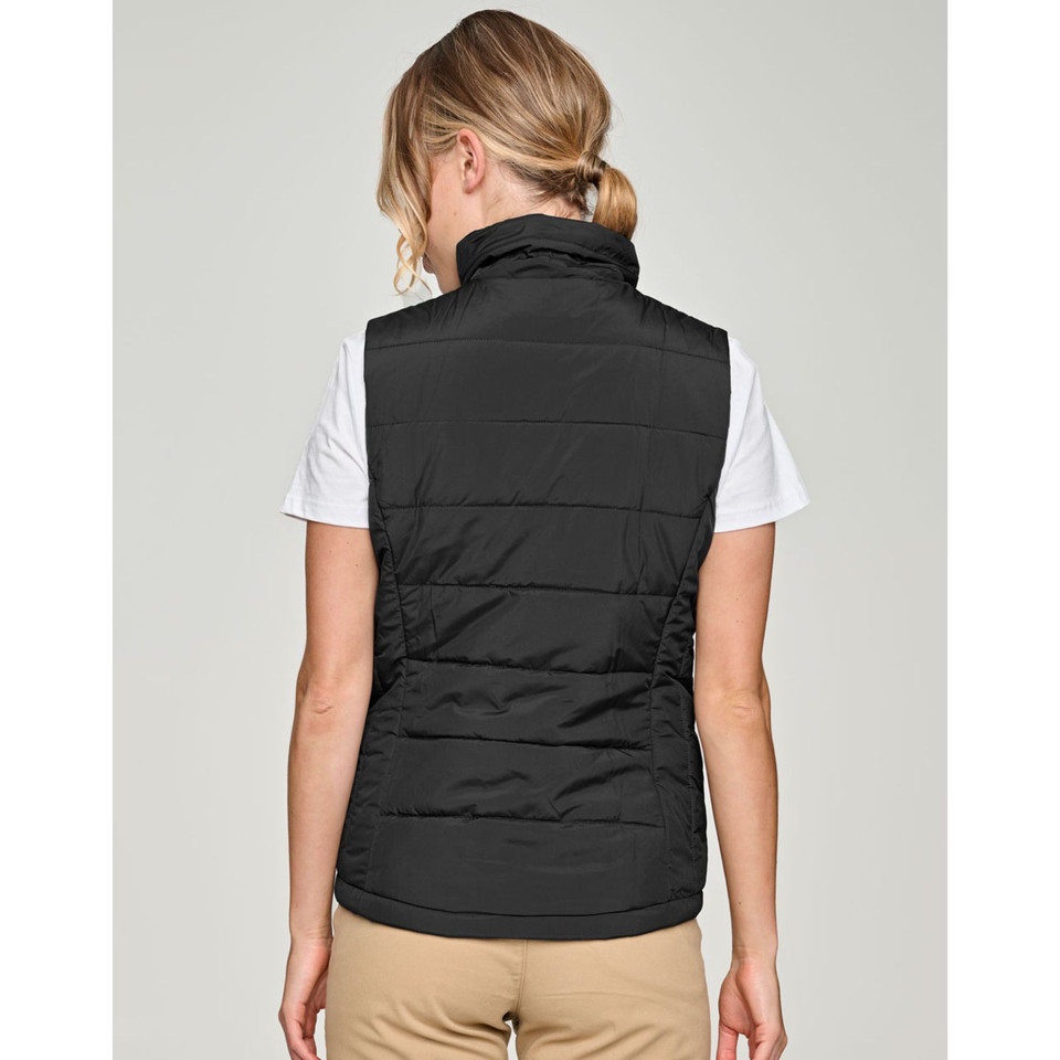 Rear view of woman wearing black quilted puffer vest with high collar and horizontal baffle panels