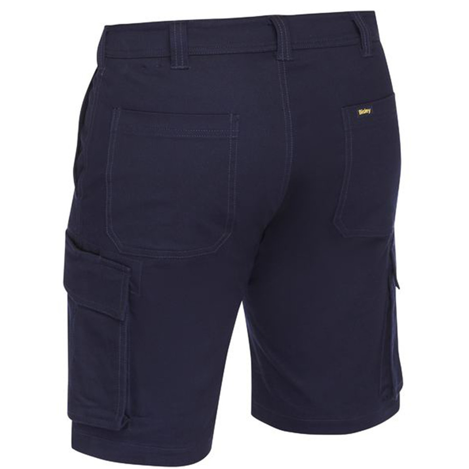 Navy stretch cotton drill cargo shorts with side cargo pocket, rear patch pocket, and yellow contrast stitching — rear three-quarter view