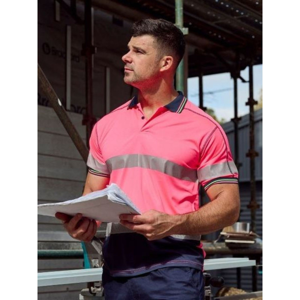 Fluorescent pink hi vis polo with reflective tape and navy contrast collar and sleeve trim