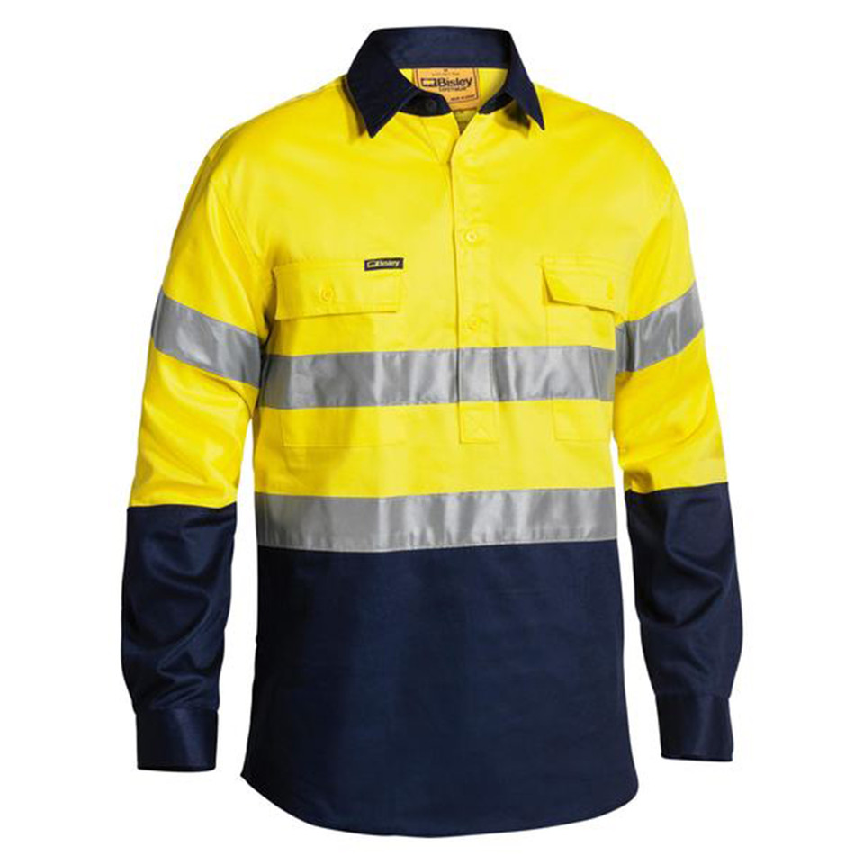 Yellow and navy two-tone hi vis closed front drill shirt with silver reflective tape across chest and sleeves