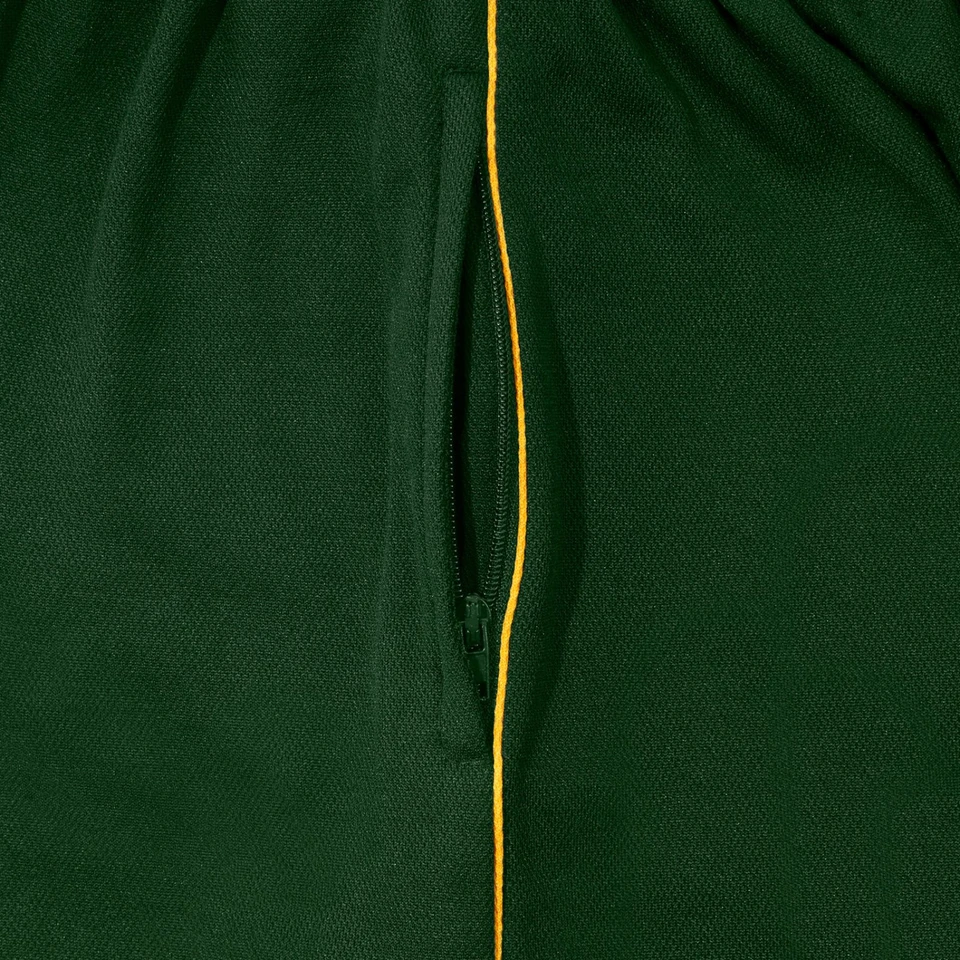 Bottle green sports skort with gold contrast piping and side pocket detail