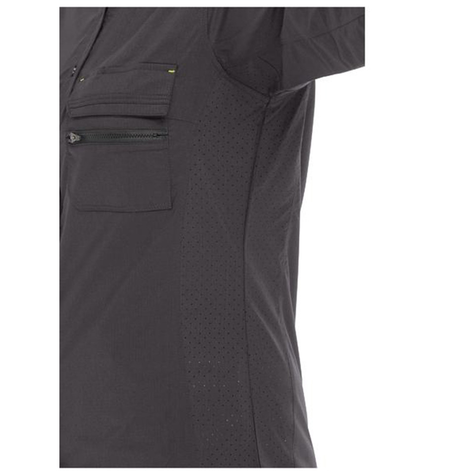Close-up of charcoal stretch ripstop shirt showing chest zip pocket and perforated mesh side panel