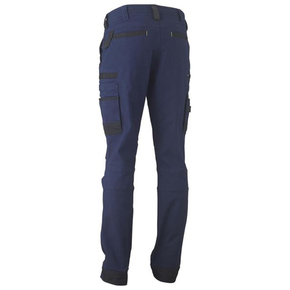 Navy stretch cargo pants rear view showing charcoal contrast utility pockets and knee articulation