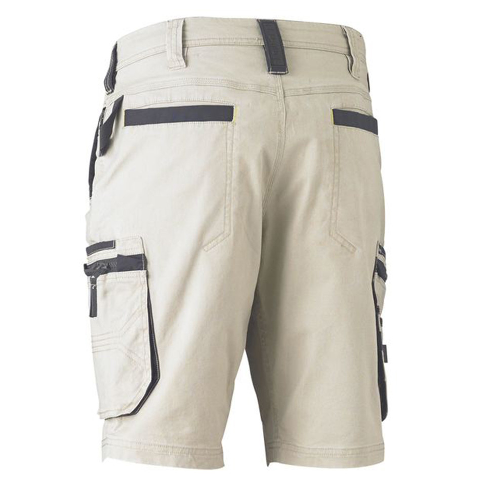 Sand cargo shorts rear view with charcoal contrast panelling, zip pockets and utility side pockets
