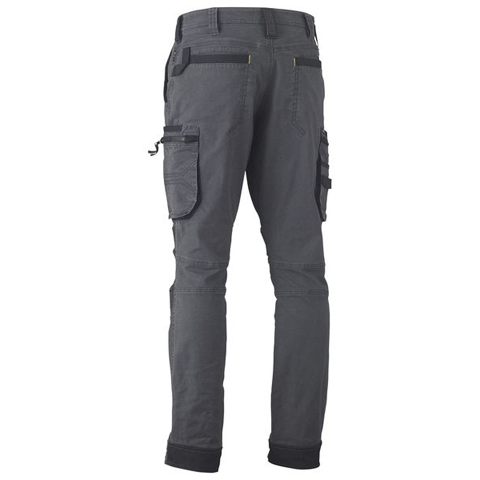 Charcoal grey ladies cargo pants with utility pockets and reinforced knee panels, rear view