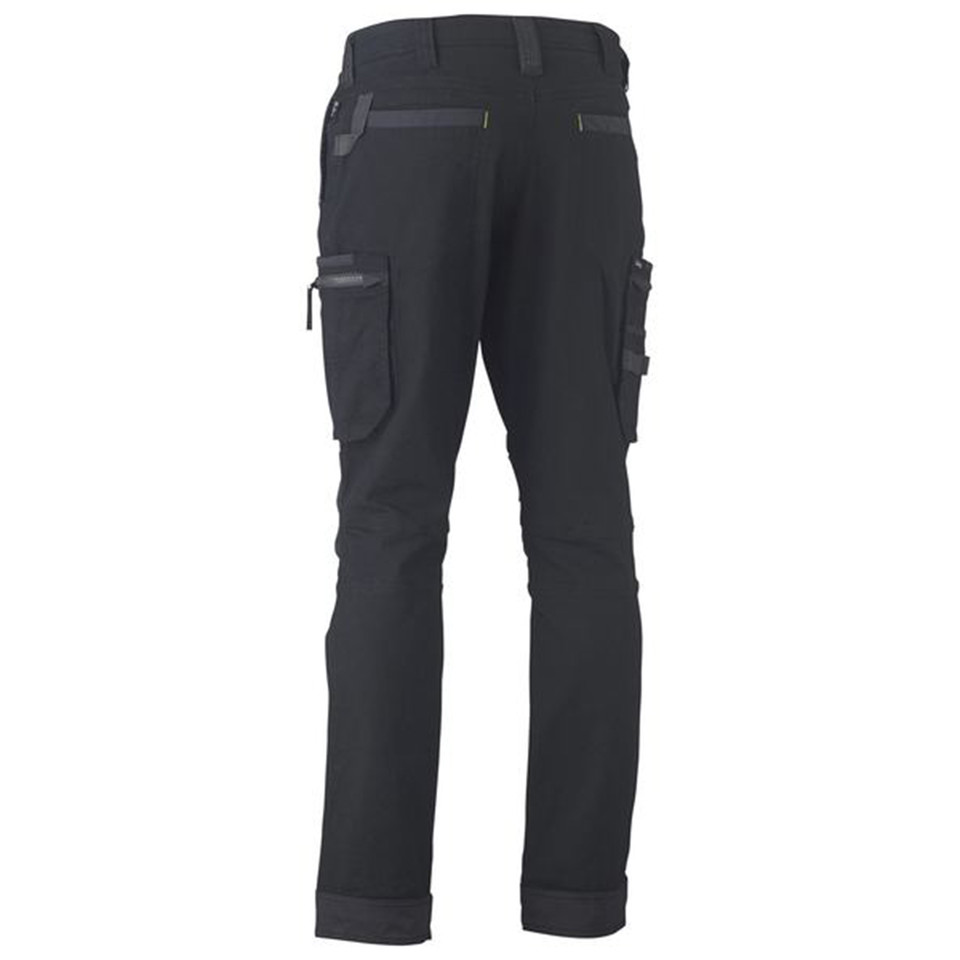 Charcoal stretch cargo pants rear view, contrast dark panels, zip cargo pockets, utility loops, slim leg