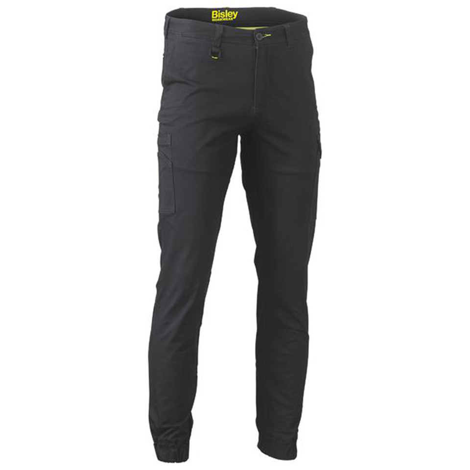 Charcoal grey stretch cargo pants with cuffed ankles, side pockets, and yellow waistband detail