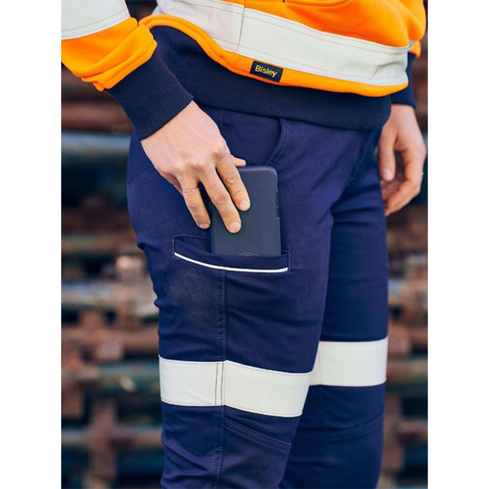 Navy work pants with orange shoulder tape, white reflective tape on cargo pocket and leg panels